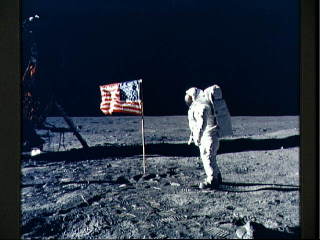 Buzz Aldrin and U.S. flag on the moon