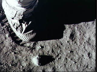 Astronaut steps onto the moon